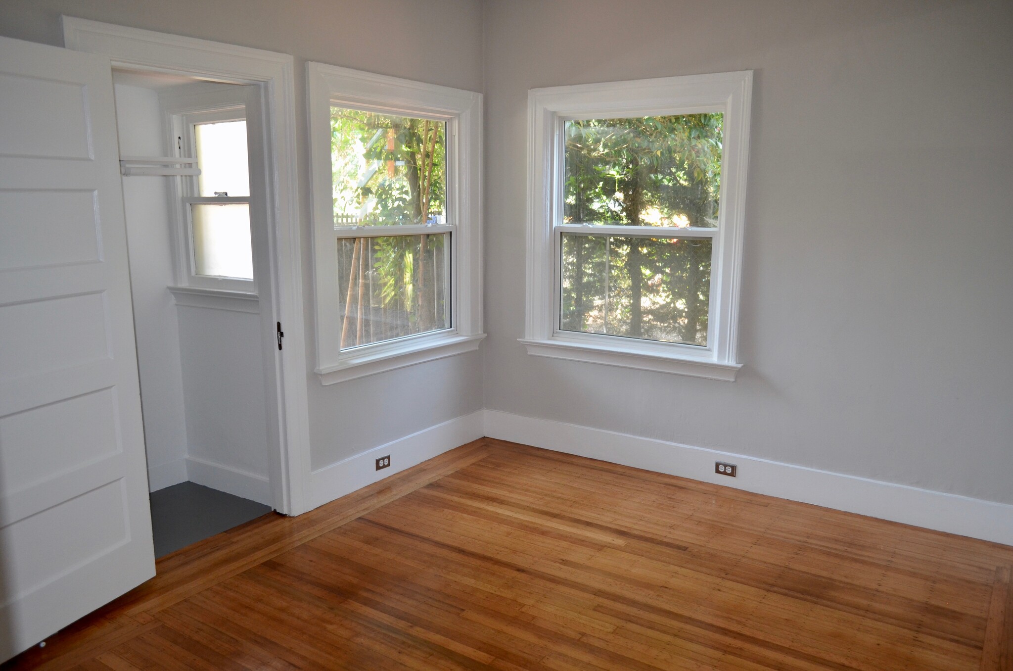 2nd bedroom windows look out to backyard - 568 Merrimac St