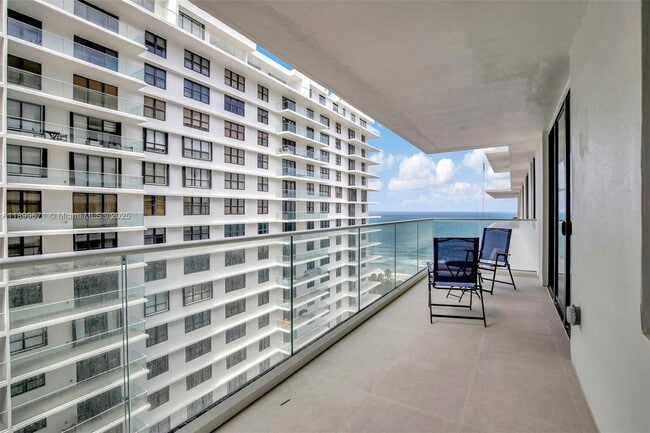 Building Photo - 9801 Collins Ave