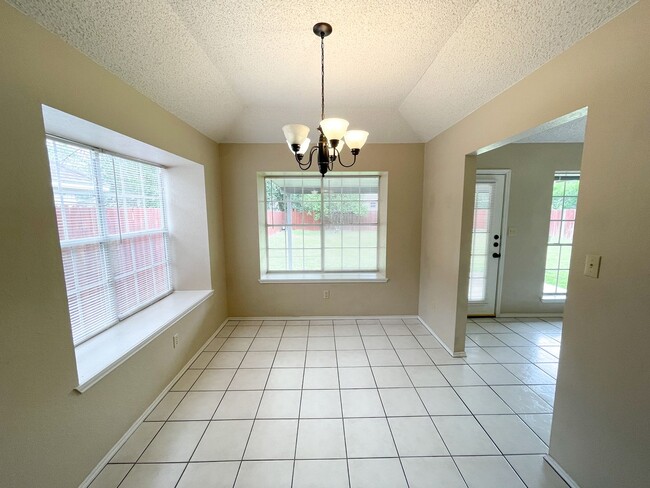 Building Photo - Live near the schools, shops, and dining y...