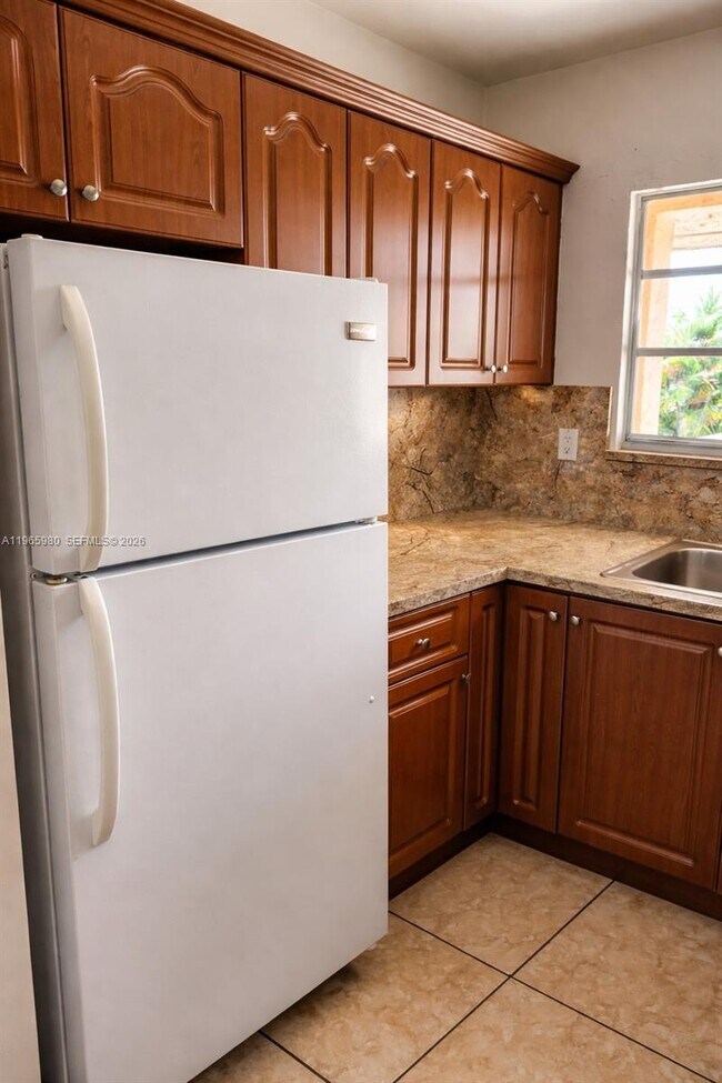 Building Photo - 6850 W 14th Ct