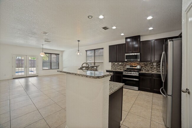 Building Photo - GORGEOUS 3-BEDROOM HOME WITH SPARKLING POOL