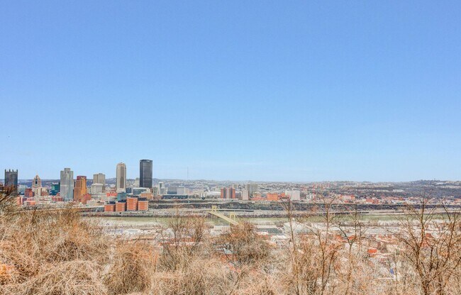 Building Photo - Available JULY 2026  - RENOVATED 3 Bedroom Home w/ Garage, City Views + MORE!