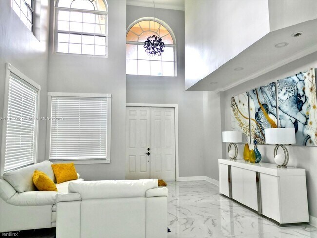 Building Photo - 3 br, 2.5 bath House - 8910 NW 45th Ct # 0