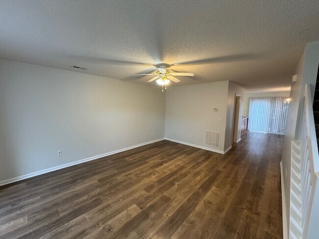 Building Photo - Spacious Home with Three Private Suites