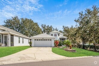 Building Photo - Stunning Custom Rental in Gated 55+ Royal ...