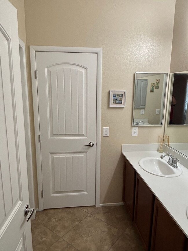 Building Photo - Gated 3-Bedroom Home with Community Pool Near Fort Apache & Blue Diamond