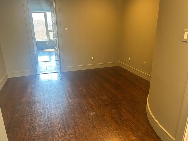Building Photo - Beautiful Condo with Amazing Roof Top Deck