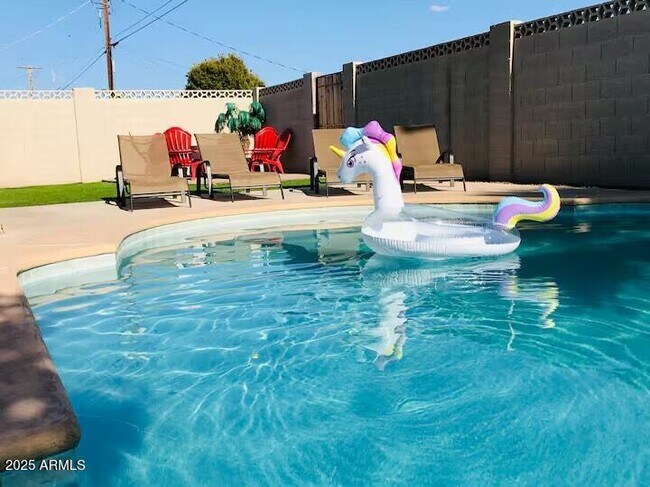 Building Photo - 8447 E Sheridan St