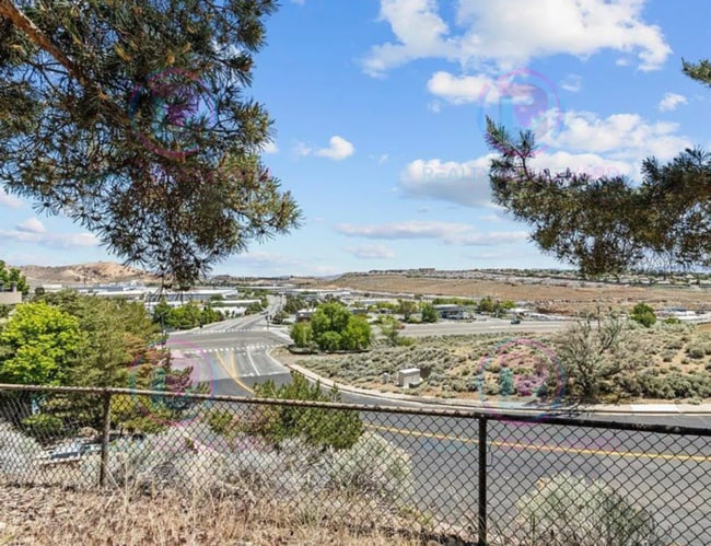 Building Photo - Incredible condo near UNR! This charming 2...
