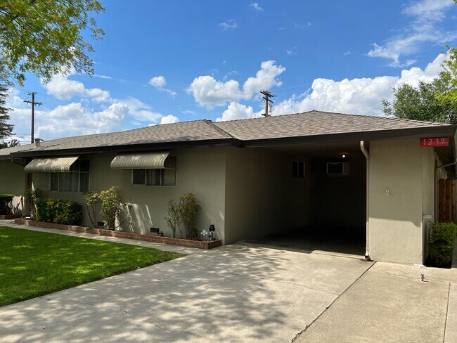 Building Photo - Two-bedroom single story unit with a carport!
