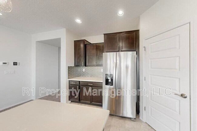 Building Photo - 6405 Kings Cyn Cv NE