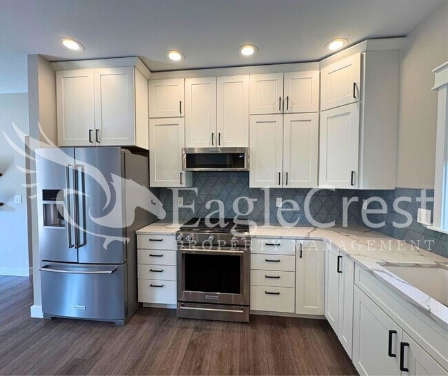 Building Photo - Contemporary Home With A Covered Patio & Quartz Countertops
