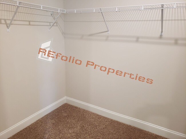 Building Photo - Charming 4 Bedroom, 2.5 Bath, 2-Car Garage...