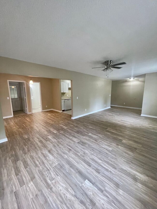 Building Photo - Spacious 4-Bedroom, 2-Bath Home with Fenced Backyard & Lawn Care Included
