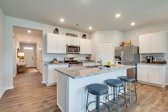 Building Photo - Brand New Construction - 4 bedroom 2 full ...