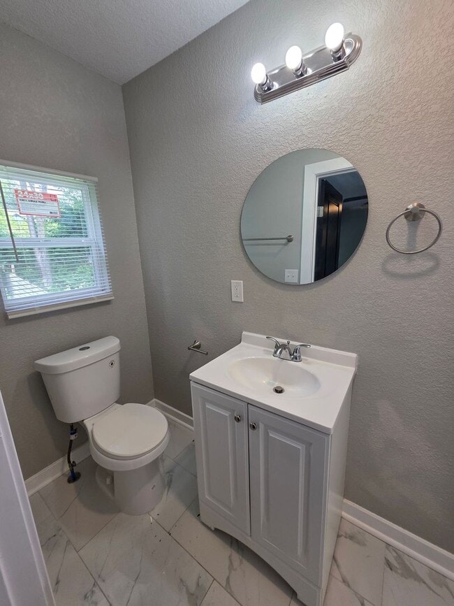 Building Photo - Spacious 4-Bedroom, 2.5-Bath Home with Hardwood Floors