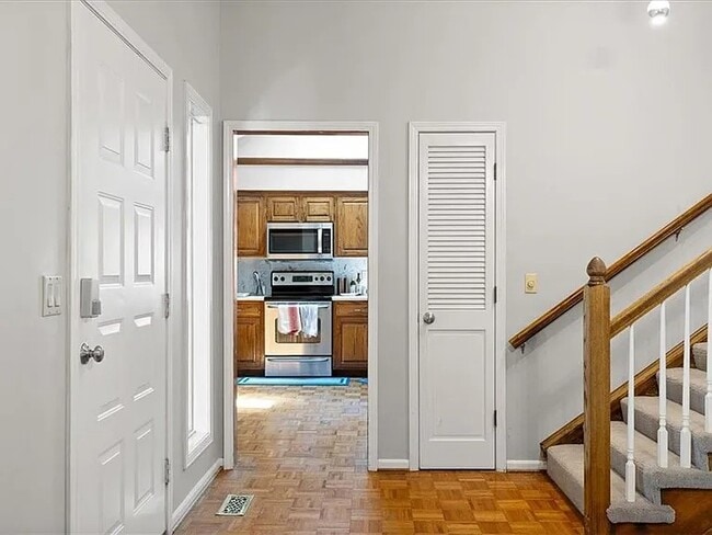 kitchen + coat closet - 8323 W 120th Ter