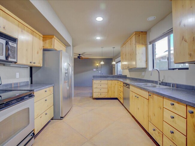 Building Photo - Stunning 4-Bedroom Home with Open Layout & Large Backyard!