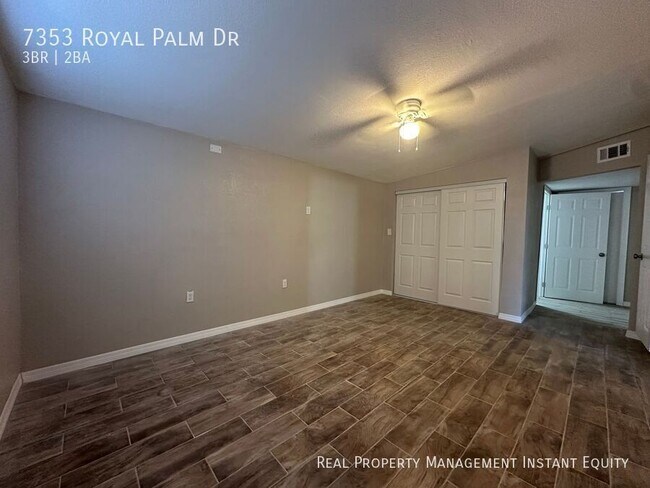 Building Photo - 7353 Royal Palm Dr
