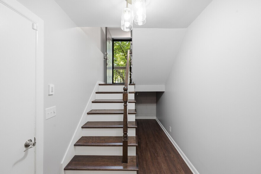 Stairs up from garage/laundry - 254 Summit Ridge Dr