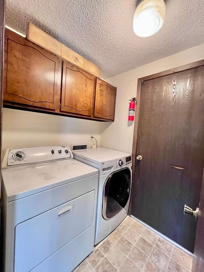Building Photo - NEW PAINT, FLOORING & APPLIANCES! 2 Bedroo...