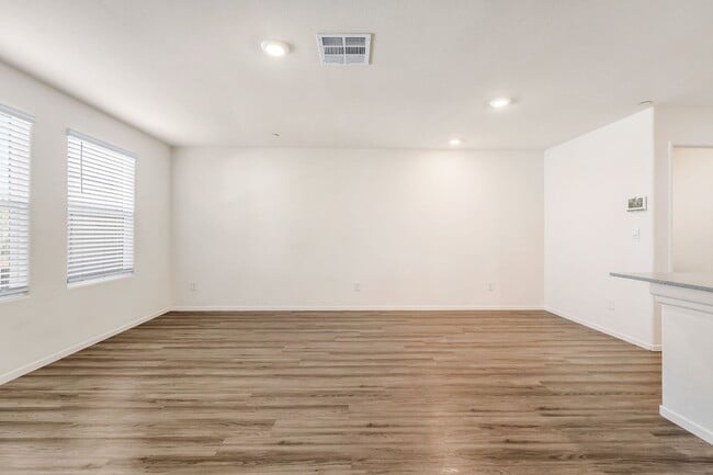 Building Photo - Modern West Henderson Townhome with Sleek Upgrades & Smart Home Features!