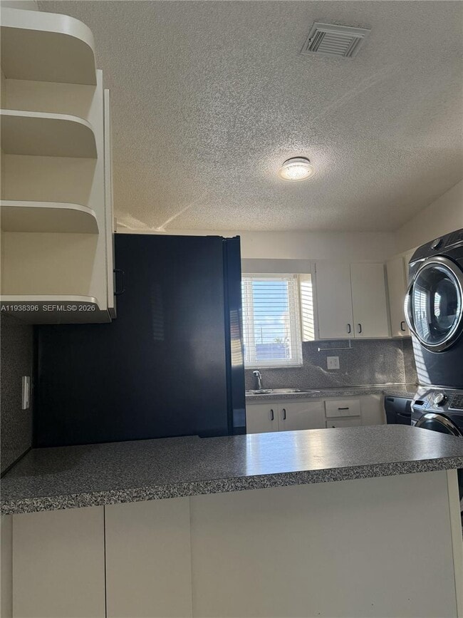 Building Photo - 10101 W Okeechobee Rd