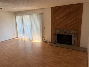 Building Photo - "One Month FREE with signed 12 month lease. Charming 1-Bedroom Condo Retreat with Fireplace and W...