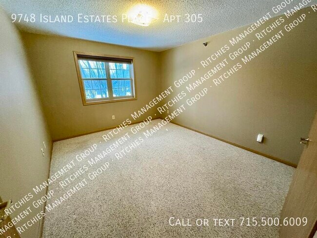 Building Photo - 9748 Island Estates Pl