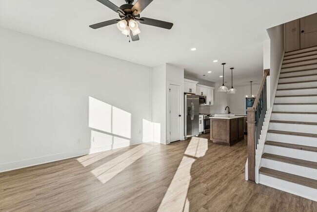 Building Photo - High-End 2BR Townhome | Rooftop Terrace + 2-Car Garage | 24-Unit Commnity