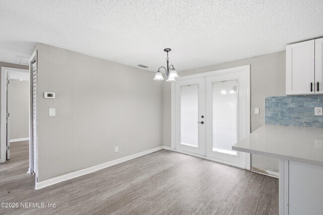 Building Photo - 7386 Dostie Dr E