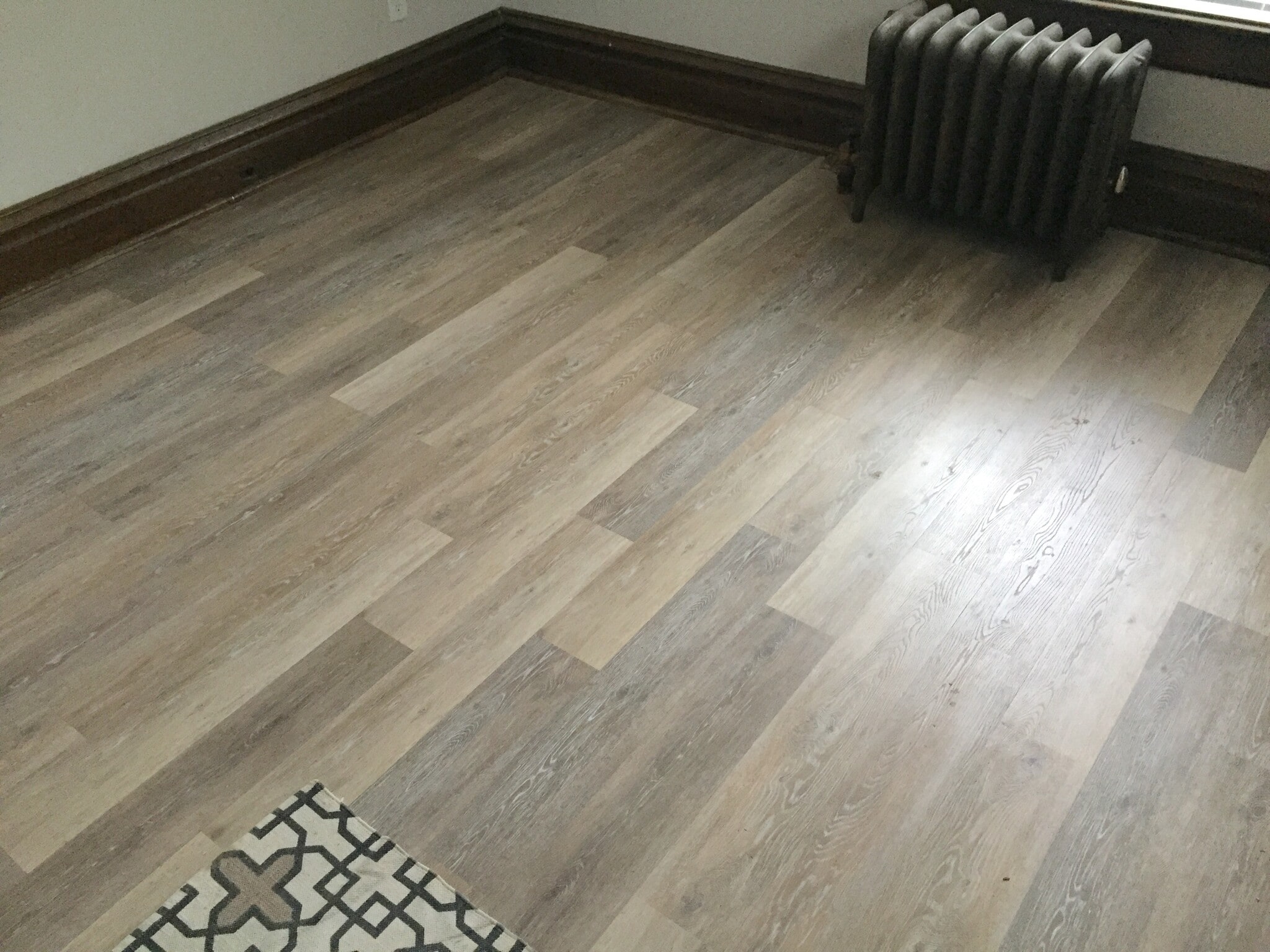 View of premium “heathered oak” vinyl plank flooring. - 350 Cobun Avenue