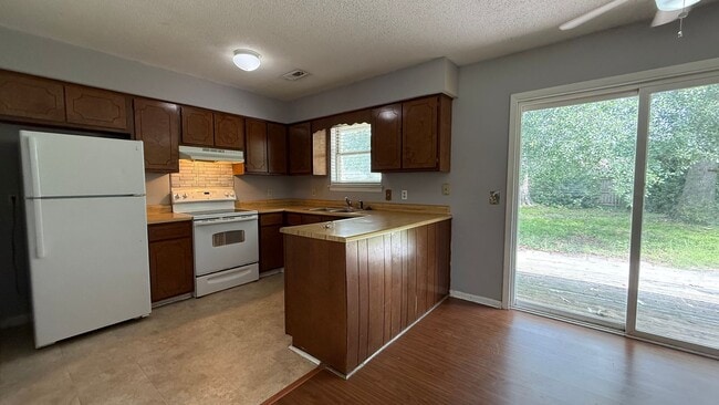 Building Photo - Charming 3-Bedroom Home in the Heart of Ri...