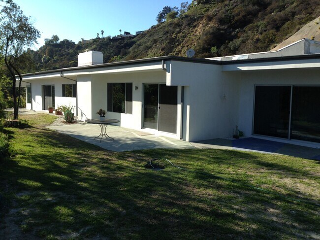 Backyard, mature olive and pomegranate trees - 2657 Zorada Dr