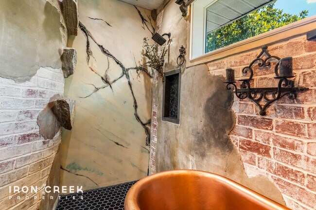 Building Photo - Beautifully Updated Three-Bedroom with Koi...