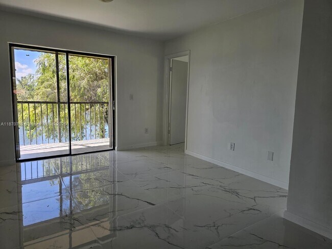 Building Photo - 6565 W 26th Dr