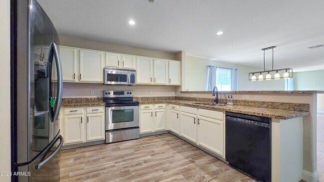 Building Photo - 25673 W Northern Lights Way
