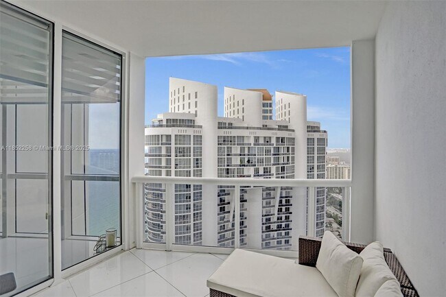 Building Photo - 18201 Collins Ave