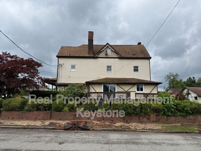 Building Photo - 705 E 18th Ave