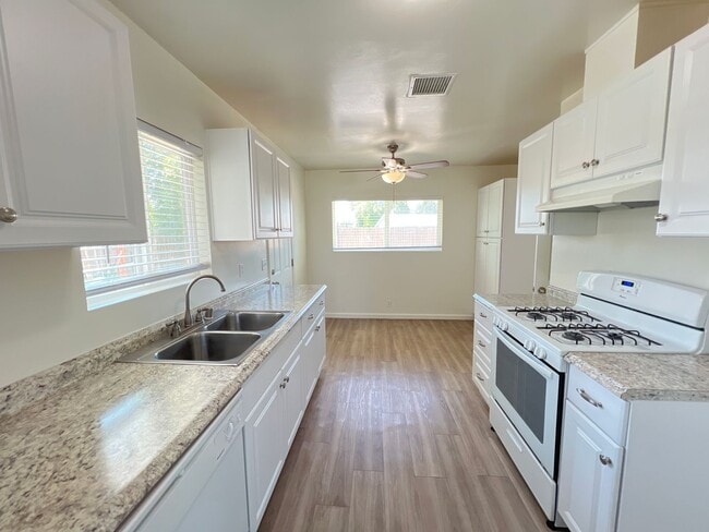 Building Photo - Remodeled 3 Bed Home w/ Fireplace, Garage & Huge Backyard – 93309