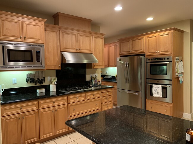 Kitchen with double ovens, gas range, butler’s pantry to dining rm, plus walk in pantry - 228 Ranch Ln