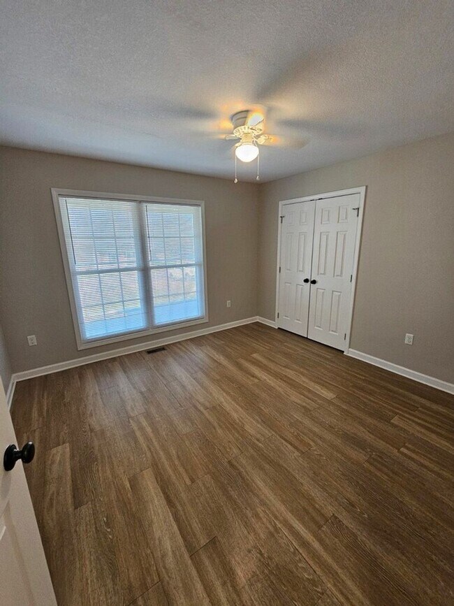 Building Photo - Spacious 3-Bedroom Home in Crossville with 2-Car Garage, Fenced Yard & Porches