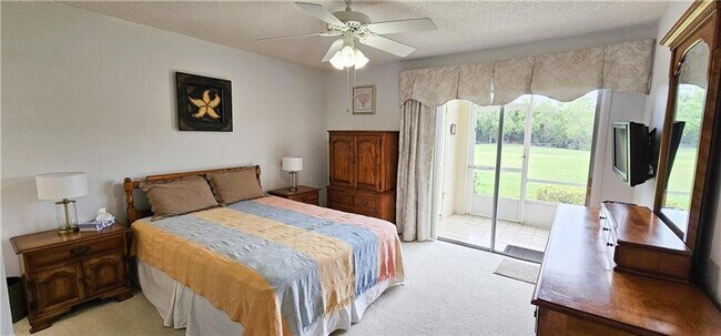 Building Photo - Annual Fully Furnished 2/2 Condo with Golf...