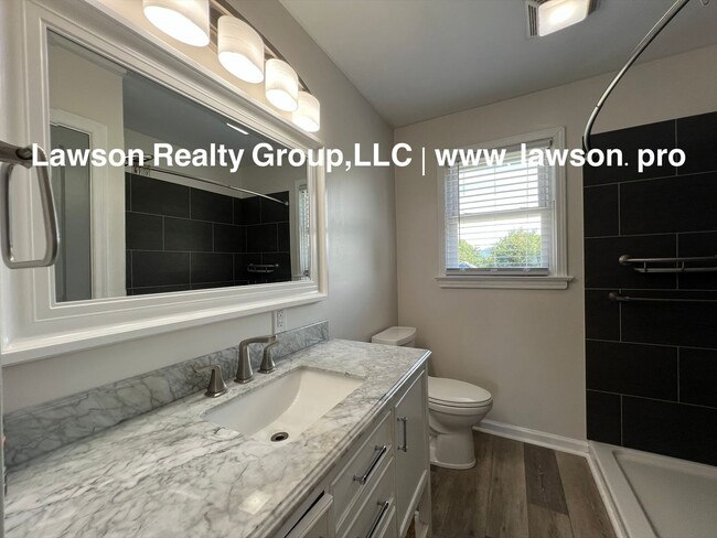 Building Photo - Updated, Cozy, and Clean- One Level Living...