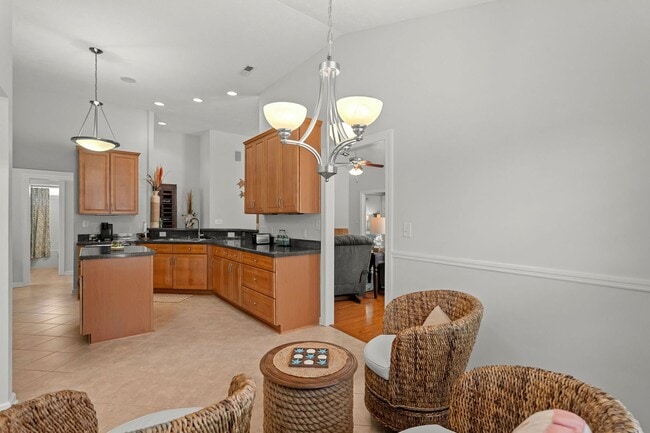 Building Photo - Live the Coastal Lifestyle in This Cypress Keys Beauty!