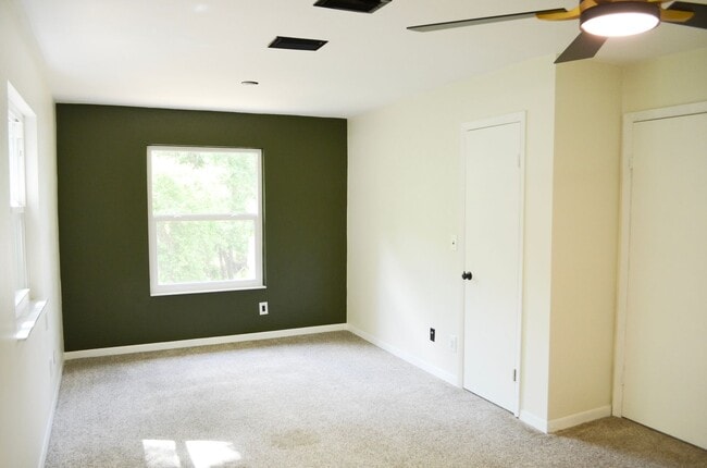 Building Photo - Check out this huge private fenced back yard at this Timberlane home!