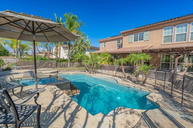 Building Photo - Spectacular 5-Bedroom Home with Private Po...