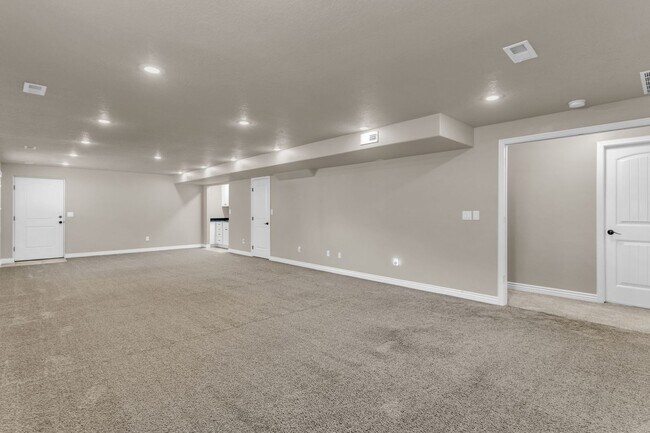 Building Photo - Spacious Syracuse Home with Covered Deck, Loft & Oversized 3-Car Garage