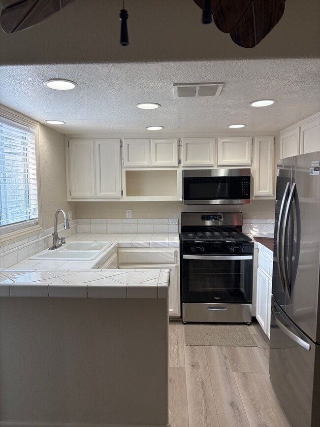 Building Photo - Cozy Loft-Style Studio - For Rent