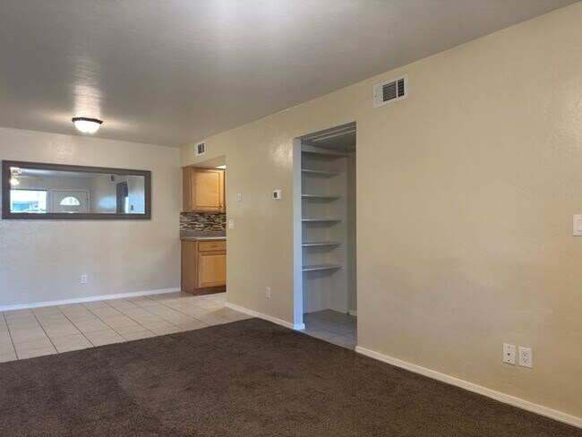 Building Photo - Sun-Drenched 1-Bedroom Condo in Central Tucson | Gated Community with Pool